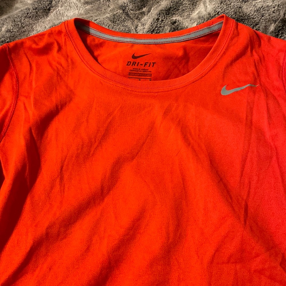 women’s red nike shirt